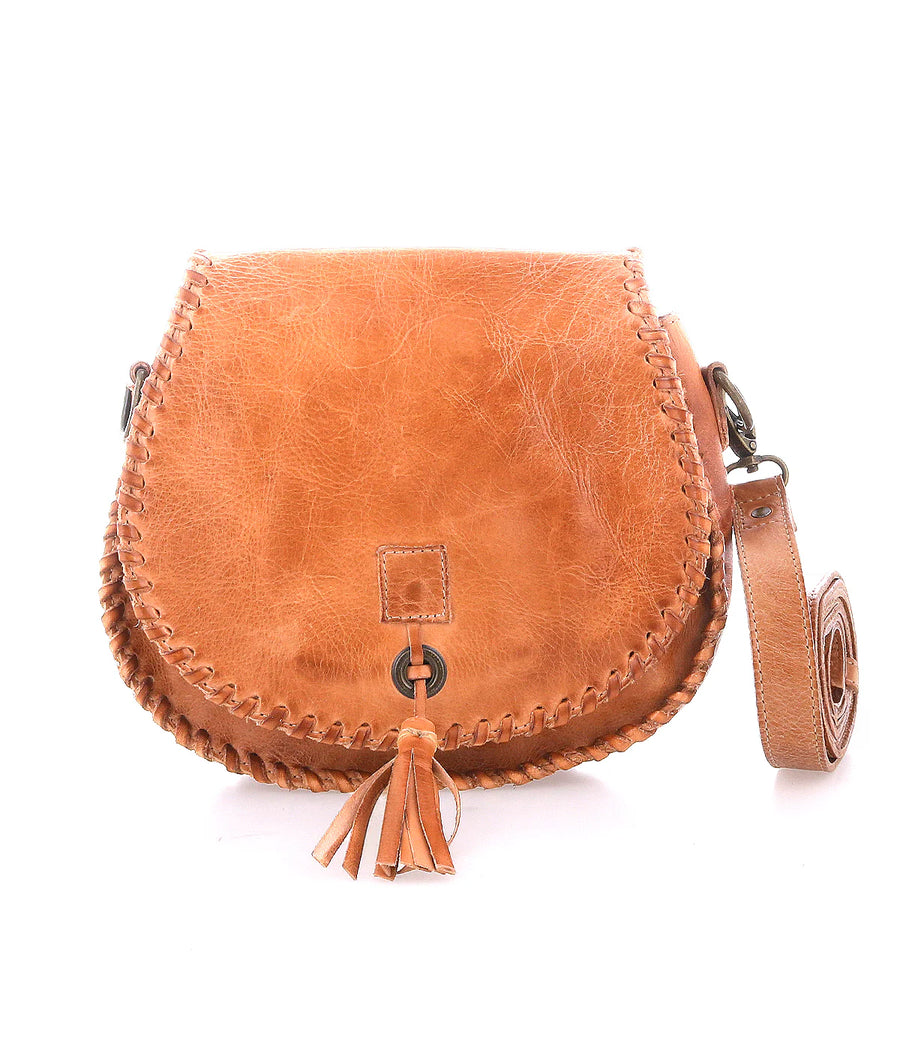 Half Moon Canyon Crossbody Bag in Tan Rustic  — genuine leather crossbody with Western-style stitching and tassel accent