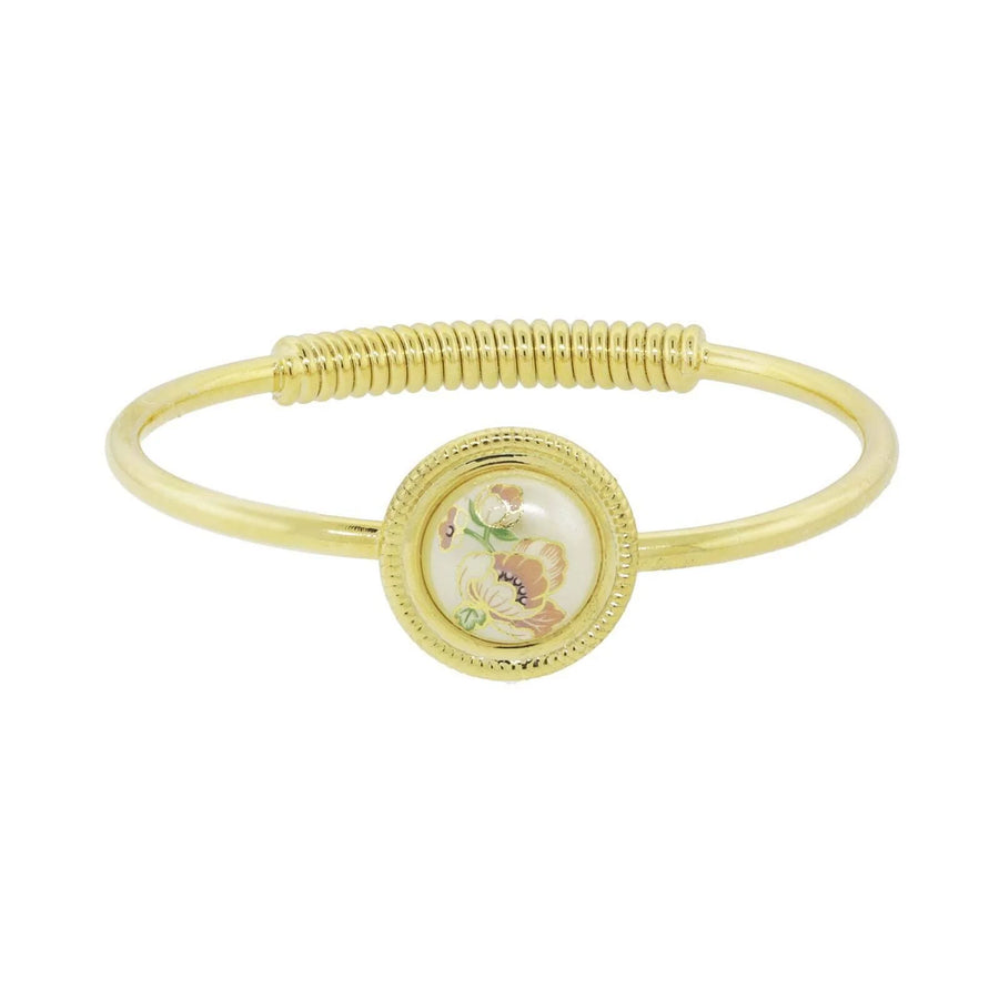 Vintage Floral Pearl Accent Bangle Bracelet featuring gold-tone bangle design with floral pearl centerpiece and delicate vintage-inspired botanical detailing