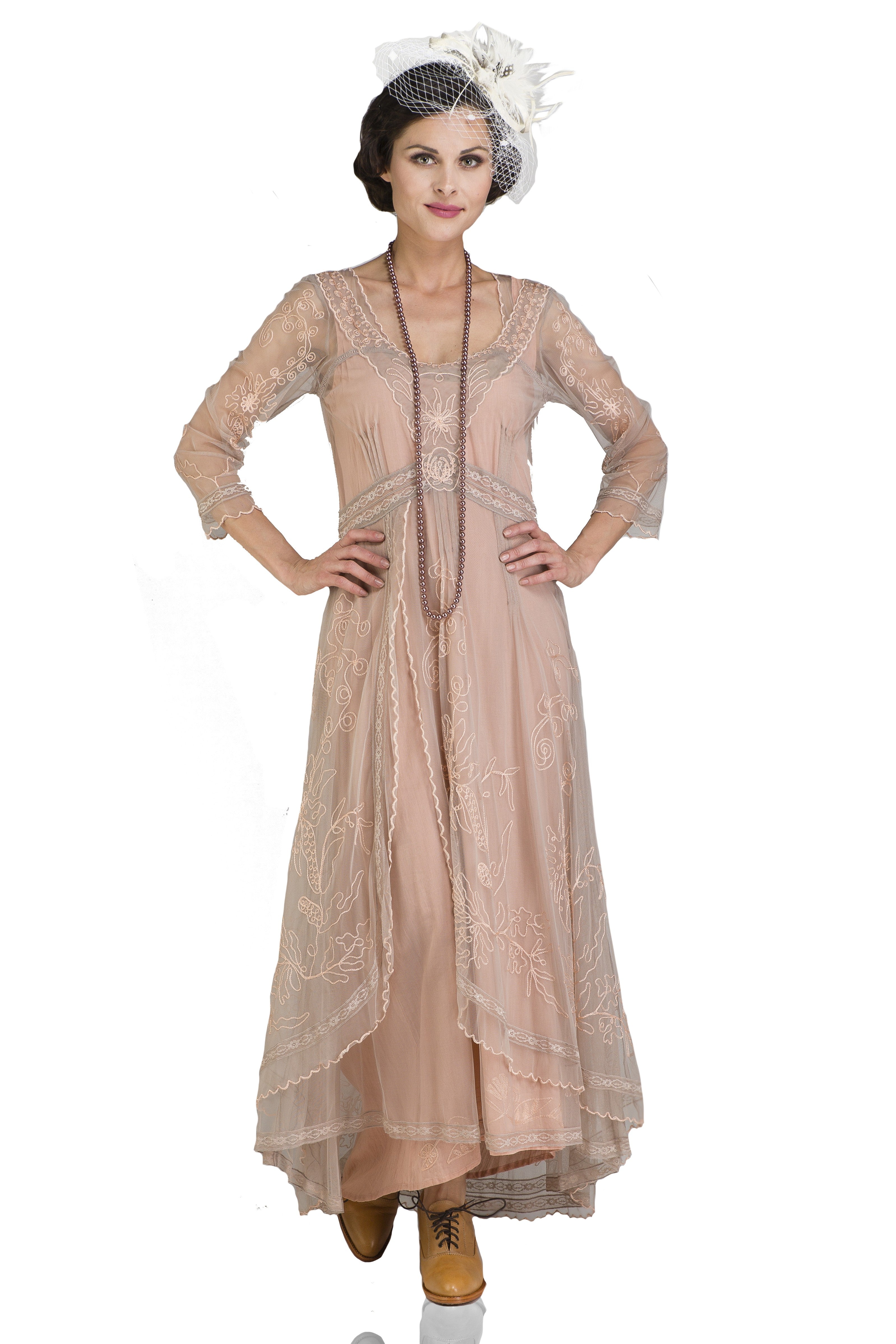 model wearing a Downton Abbey Tea Party Gown in Quartz by Nataya