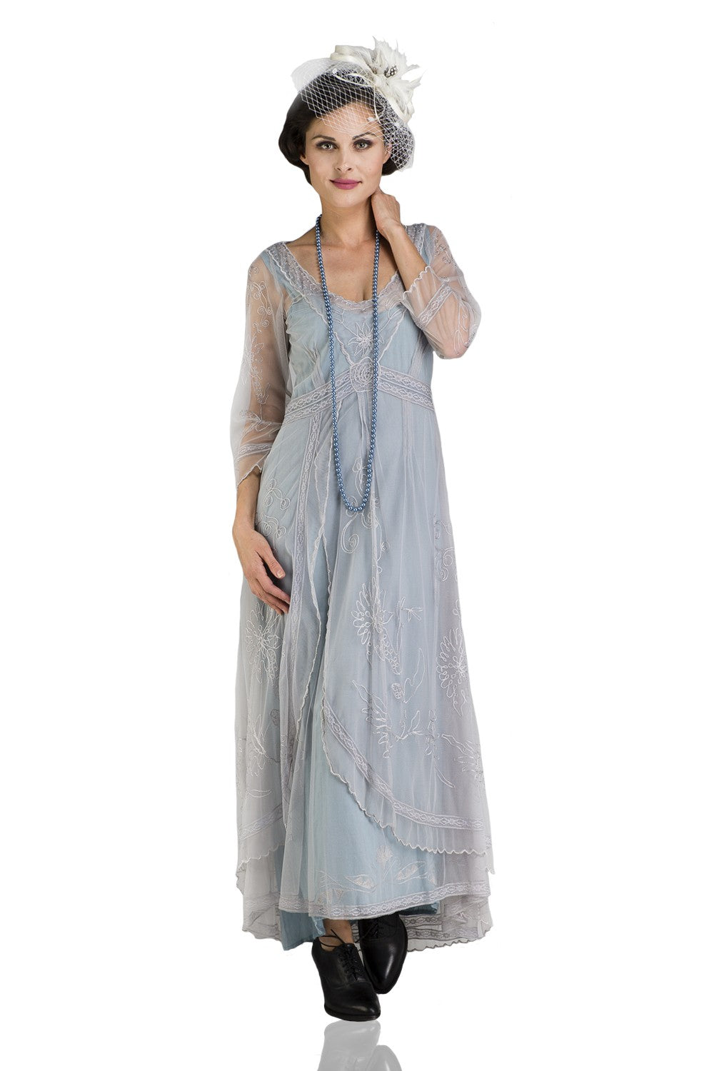 model wearing a Downton Abbey Tea Party Gown in pale blue by Nataya