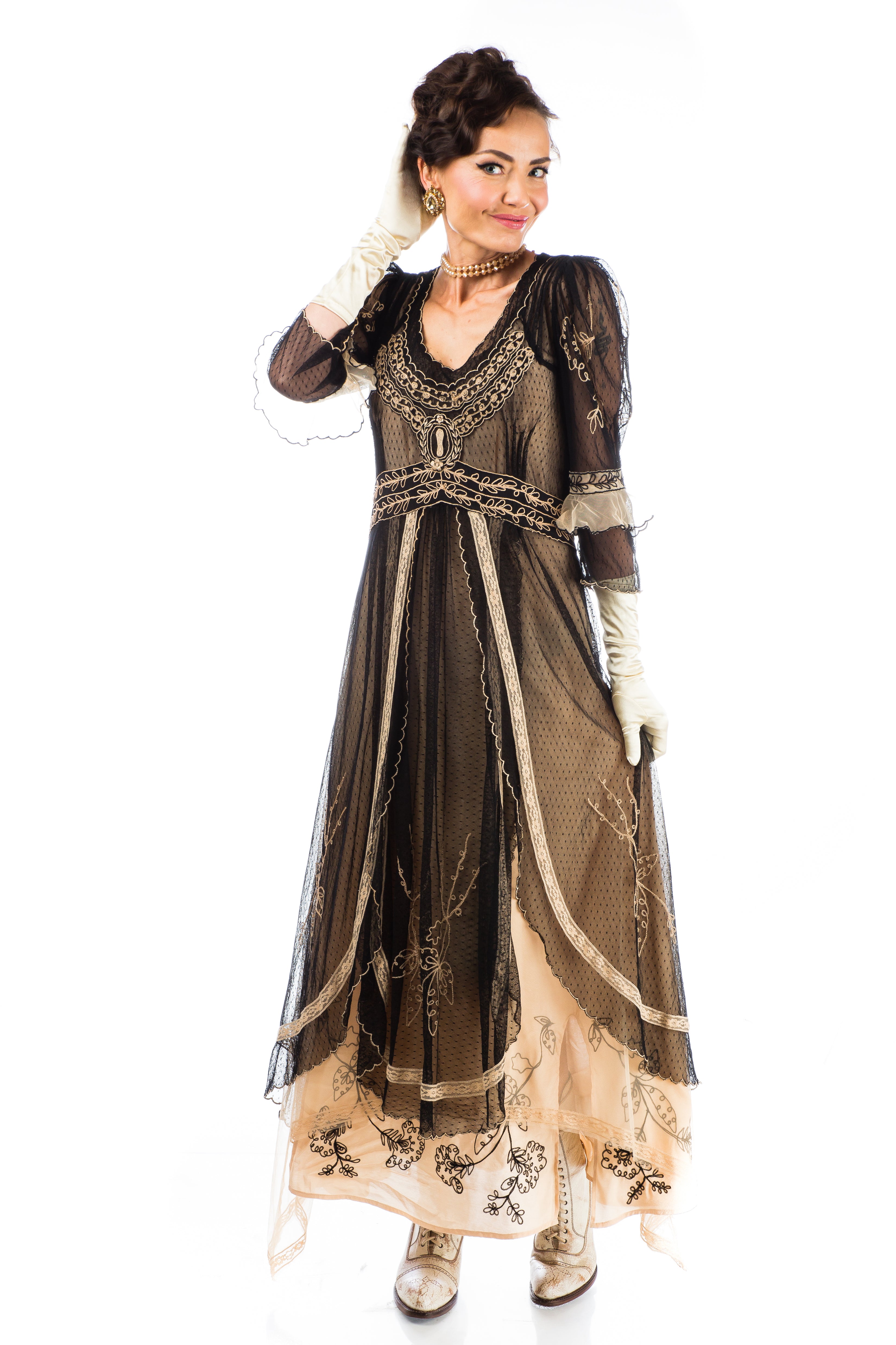 model in a black-and-beige 1920s Titanic Style Dress with lacy accents