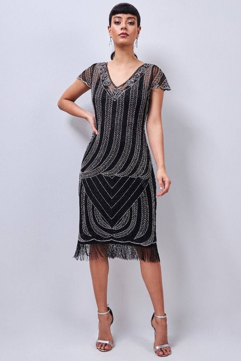 knee length flapper dress Dorothy 1920s Fringe in Black by Gatsby Lady – WardrobeShop The dress has an CATEGORY: DRESS Color:Gold/Silver Simone Velvet Dress: Red